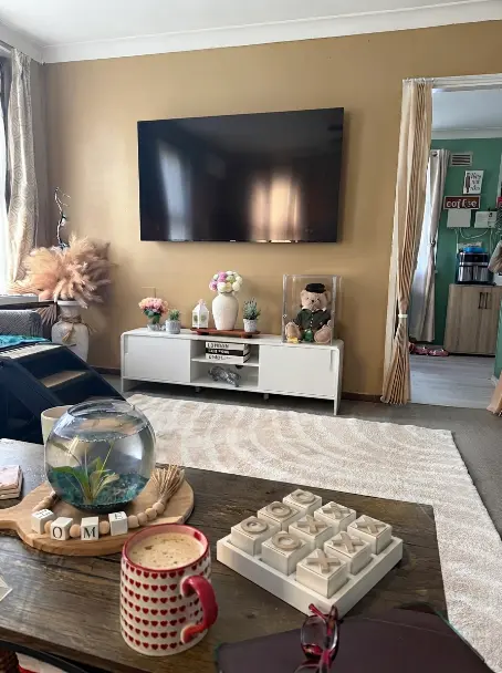 TV wall mounting in a Sydney family living room